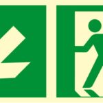 Znak TDC, Kierunek do wyjścia ewakuacyjnego – w dół w lewo 1